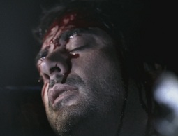 John, unconscious after the car crash...